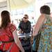 Brent Richards chats with customers at his wife Melissa's Sweet Dirt ice cream cart at the Ann Arbor Farmers Market on Wednesday, July 24, 2013. Melanie Maxwell | AnnArbor.com